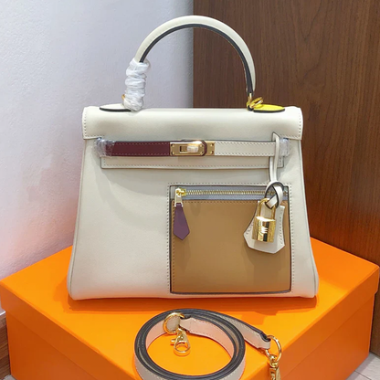Creamy Off-White Multi-Tone Accent Compact Trapezoid Hand Carry Bag With Golden Twist Lock Hardware And Built-In Front Zippered Pocket